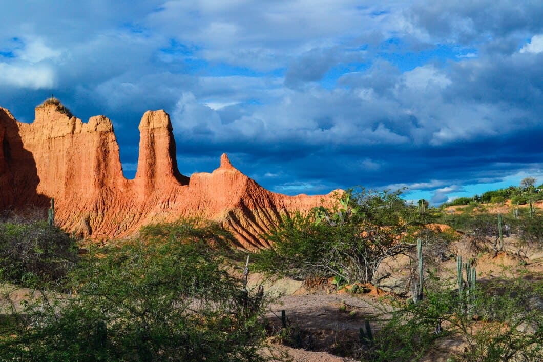 Arid red landscape under a wide sky